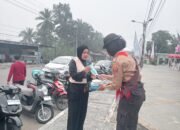 Hadapi Udara Tidak Sehat, Kwarcab Sawahlunto Gelar Aksi Berbagi Masker