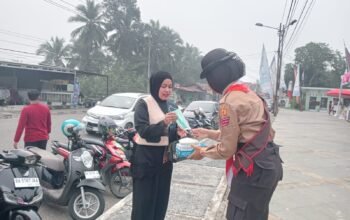 Hadapi Udara Tidak Sehat, Kwarcab Sawahlunto Gelar Aksi Berbagi Masker